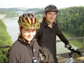 standing on the bridge to bern with our mountain bikes and the cycling trip was underway